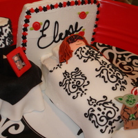 Bed The red thing and Yoda at the end of the bed were a joke with my friend....and there's a pic of me on her bedside table in a fondant...