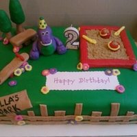 Barney Cake Barney at the park for Bella's 2nd Birthday! White cake with vanilla icing covered in Duff fondant. All fondant accents with brown...