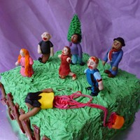 Zombie Horde Birthday Cake Zombie Horde Birthday cakeRich chocolate cake with cherry jam and golden buttercream fillingZombies made from gumpaste