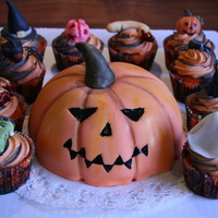Pumpkin Cake And Halloween Cupcakes! Inside the cake: limecurd and liquorice cream mousse. Cupcakes are vanilla/chocolate also the frosting (colored buttercream).
