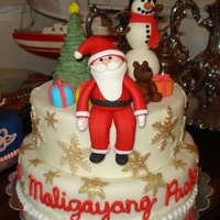 Maligayang Pasko - Merry Christmas! Gumpaste figures with fondant smowflakes painted with gold luster dust.