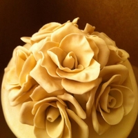 Ivory Gumpaste Roses these are roses i made for the top of a wedding cake i did. my first time to make them. used francesca tutorial.