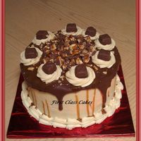 Snickers Cake My son wanted to make me a bday cake this yr so I helped him make me this Yummy Snickers Cake. Chocolate cake w/nougat filling, covered in...