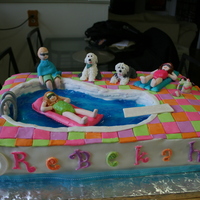 Neon Swimming Pool Party Cake This is a cake I made for Icing smiles charity rainbow white cake with fondant gum paste figures and lots of disco dust