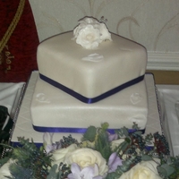 Wedding Cake A two tier square offset wedding cake, the top tier is lemon and poppyseed with lemon buttercream, the bottom tier is vanilla sponge with...