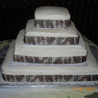 My 1St Wedding Cake With Camo This was a huge cake ordered by friends with a camo themed wedding. It was awesome. A lot of work but had fun and what a learning...