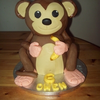 Monkey :) This is a vanilla cake, with chocolate flavoured fondant :)