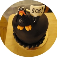 Turkey In Distress Inspired by a cake on CC. Mini-cake, two 4" yellow cakes with cranberry preserves and chocolate buttercream frosting.