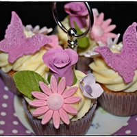 Floral Cupcakes Carrot cc with cream cheese frosting and fondant toppers.