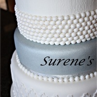 Chocolate Cake With Ganache Covered In Fondantwith Fresh Flowera Protea On Top Chocolate cake with ganache, covered in fondant,with fresh flower,a protea on top