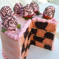 Strawberry And Chocolate Cake this is dark chocolate and strawberry checkerboard cake.. decorated w/ strawberries piped w/ melted chocolate