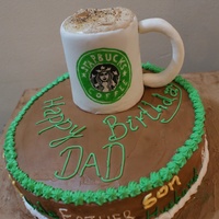 The Vanilla And Pineapple Cake Topped With A Starbucks Cup Which Is A Sinful Chocolate Truffle Cake The vanilla and pineapple cake topped with a Starbucks cup which is a sinful chocolate truffle cake.