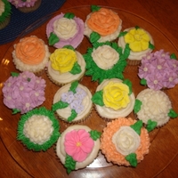 Fun With Cupcakes Orange cupcakes, filled with Orange Curd w/ coconut and orange buttercream.