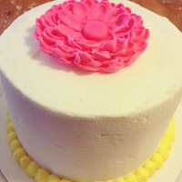 Smash Cake buttercream covered smash cake to match the big "you are my sunshine" themed cake complete with pink matching fondant flower