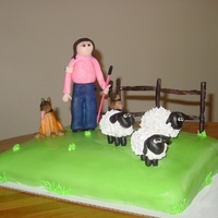 Dogs Herding Sheep MMF cake, figures are modeling chocolate. Cake was made for a lady who shows her dogs (a Belgian Tervuren and a German Shpherd) in herding...