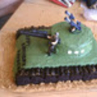 Kayden's Tank Cake This cake was for a little boy who loves Army men. It is a 13 x 9 and one 6 inch round. I used Oreos and black licorice for the tracks. The...