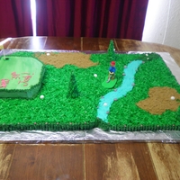 Golf Course THis was a FUN cake! Four sheet cakes, buttercream icing, coconut for grass, brown sugar for sandtraps, and trees are sugar cones, iced and...