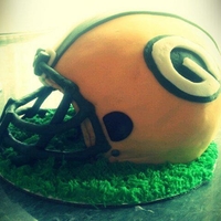 Green Bay Football Helmet This is a grooms cake that I made, I used Modeling chocolate and wire to make the face mask, that by far was the hardest part of the cake,...