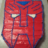 Transformers Logo Cake Large cake brought out after the Bumblebee decoy cake. Double batch of batter.