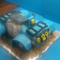 3D Atv Blue fourwheeler made with chocolate cake and modeling chocolate