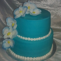 Tropical Wedding Cake 10 and 8 inch wedding cake with gumpaste orchids