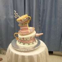 Topsy Turvy Teapot Cake My husband sent me to the "Sculpt A Cake with Colette Peters" workshop at the Wilton School in Chicago for my 30th birthday! It...
