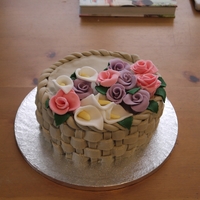 Flower Basket Cake Rosewater sponge cake covered in rosewater buttercream with buttercream and jam filling. Each piece of the basket weave is fondant and all...