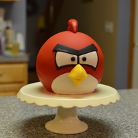 Angry Red Bird! Red Angry Bird, made with Wilton Sports Ball pan. Covered with MMF. Copied from Andrea's SweetCakes, found on Flickr