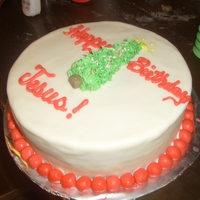 Happy Birthday Jesus 2011 yellow cake covered in mmf and bc tree and writing
