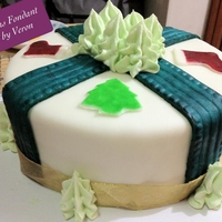 Christmas Fondant Cake Fondant decors were hand painted to give it a rustic royal look