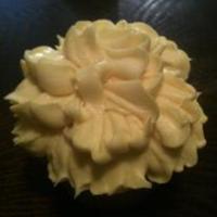 A Vanilla Flavored Cupcake With Yellow Buttercream Makes This Yellow Carnation Cupcake A Vanilla flavored cupcake with Yellow Buttercream makes this Yellow Carnation cupcake.