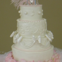 Candle Inspired Cake Traditional four tier cake, inspired by a candle brought to me by the bride. It's an all vanilla cake with buttercream icing, and...