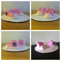Gumpaste Baby Shoes Gumpaste Baby Shoes using the 04/29/13 released tutorial that were later used on a Pregnant Belly Cake w/kicking baby foot impression....