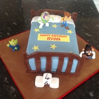 Toy Story Bed Cake sponge cake made to imitate toy story bed and charactors