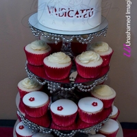 Vindicated Cake And Cupcakes I made this for a friend's Album release. I cut out her album logo on the second layer of fondant.