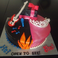 Punk/princess Gender Reveal Gender Reveal baby shower cake. Punk /Princess theme. Chocolate cake covered in MMF. Tiara and Guitar are fondant/gumpaste mix. TFL!