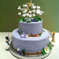 Tinker Bell A vanilla cake with strawberry filling covered with an almond buttercream. My first attempt at a two-tier cake.