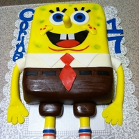 Spongebob Cake made this cake for my baby sister who loves spongebob.... triple chocolate fudge cake with vanilla pudding filling and fondant.