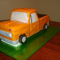 1965 Chevy Truck Carved Chocolate cake covered in fondant.
