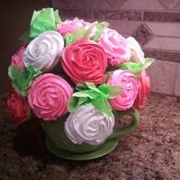Cupcake Rose Bouquet I made this for Mothers Day. I bought a container and stuffed it with a round syrofoam ball. Used toothpicks to hold the cupcakes on....