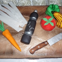 Cutting Board Groom's Cake For the groom who is a chef! Cutting board cake complete with fondant knife and veggies!