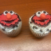 Elmo Cupcakes Elmo cupcakes - fondant faces