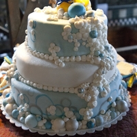 Baby Shower Bubbles! Created for my best friends Baby Shower. Each tier a different flavor adorned with buttercream and fondant bubbles, candy pearls and cake...