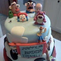 Toy Story Made for my Nephew's 4th birthday....created Mr. & Mrs. Potato Head and Etch-a-sketch; purchased the other characters. Took...
