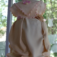 Baby Shower Dress 3D This is my first attempt to do a sculptured cake... it was a hit! I baked 10 layers of cake to do this cake.