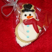 Snowman Cookies Tiny snowmen sugar cookies just to hang on our Christmas tree... disappearing every day.