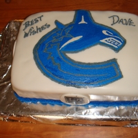 Vancouver Canucks Cake I made this cake for my friends 49th birthday he is a big Canucks fan. Logo was so easy. I printed off the logo doing it mirror image laid...