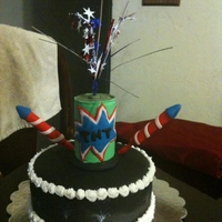 4Th Of July 1/4 sheet red, white, & blue checkerboard. Fireworks drawn on the side of cake.