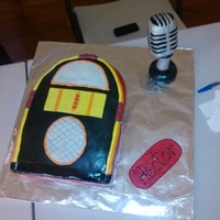 Jukebox Cake Two friends and I made this cake for a friend. The microphone is made of RKT covered in fondant and the juekebox is cake.