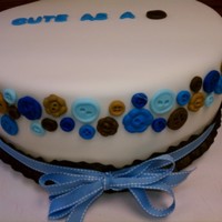Cute As A Button - Bab Y Boy Shower Cake 4 layer, buttercream filling, fondant covered and fondant buttons.